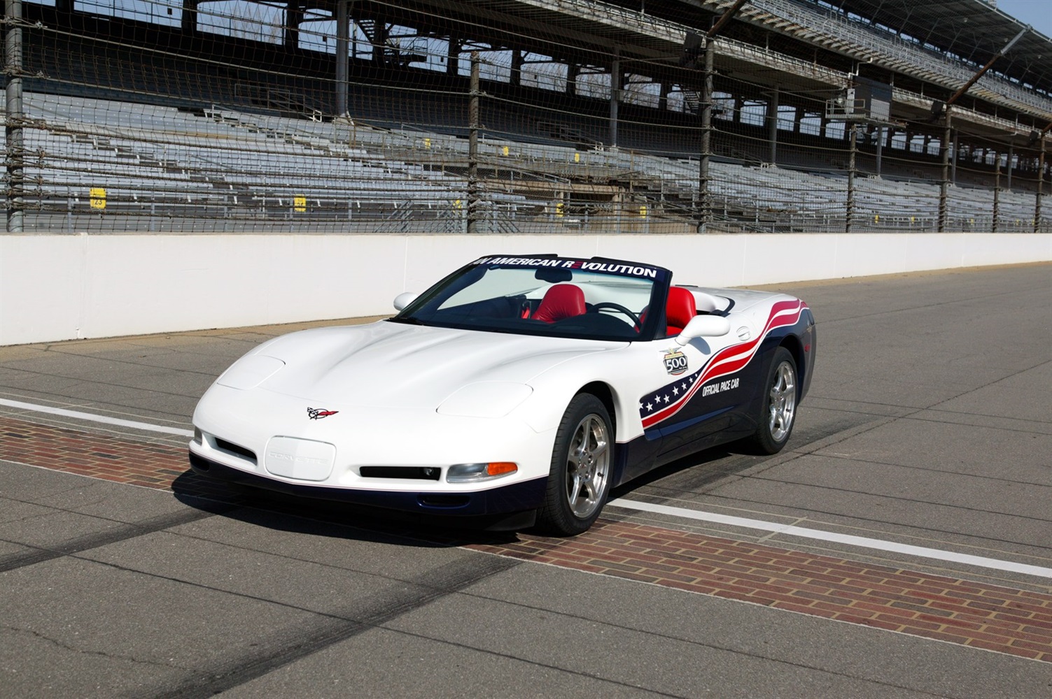 The official 2004 Chevy Corvette C5 Indy 500 Pace Car, a red, white and blue convertible with its top down. (Photo credit: Indiana Motor Speedway)