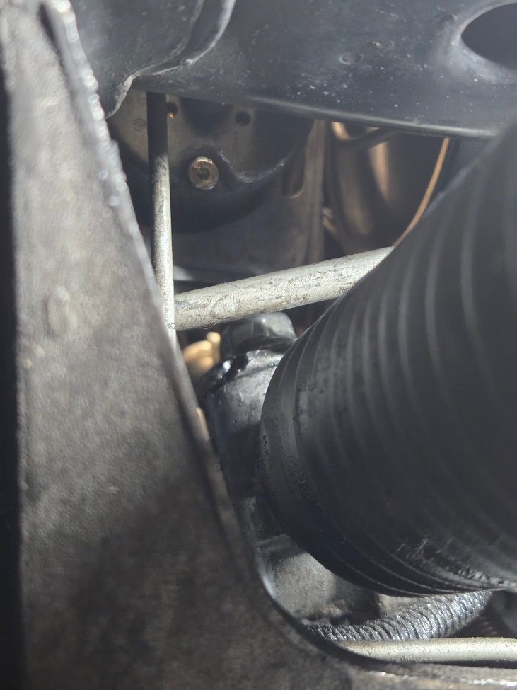 C5 Corvette steering rack as viewed from behind