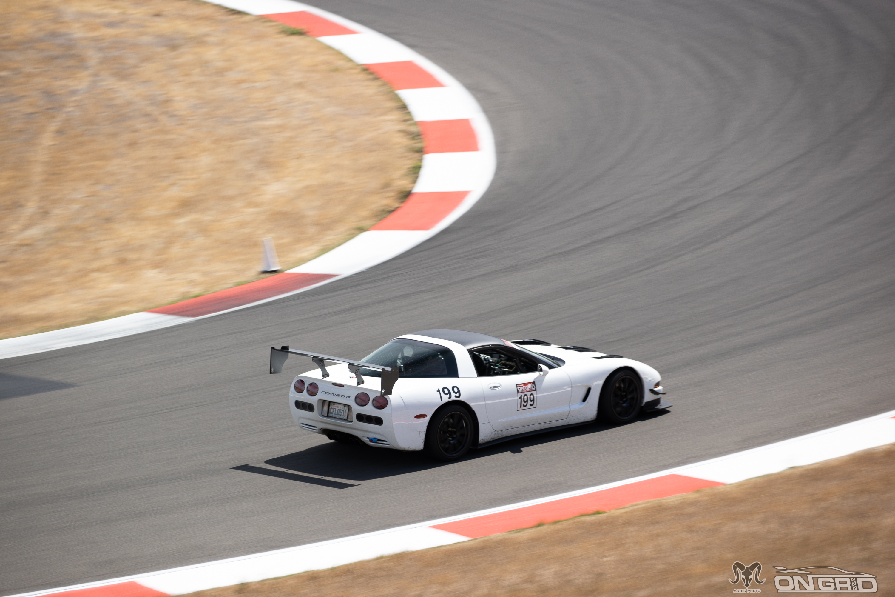 #199 C5 Corvette out on track at Ridge Motorsports Park. The 9 Lives Racing Wing is mounted, as can be seen by the CFD shaped wing endplates