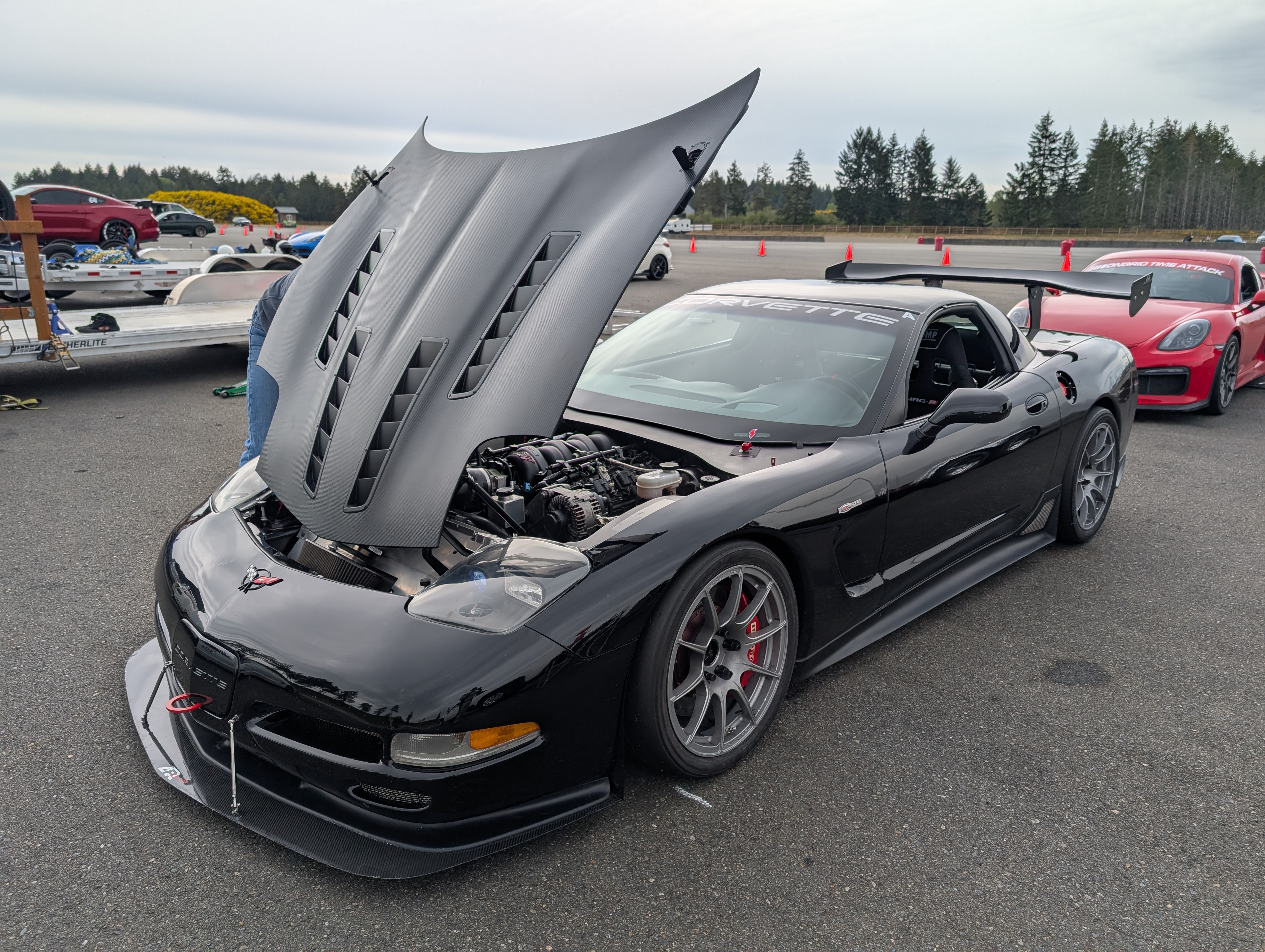 A black highly customized C5 Z06 Corvette with full carbon fiber Aero.