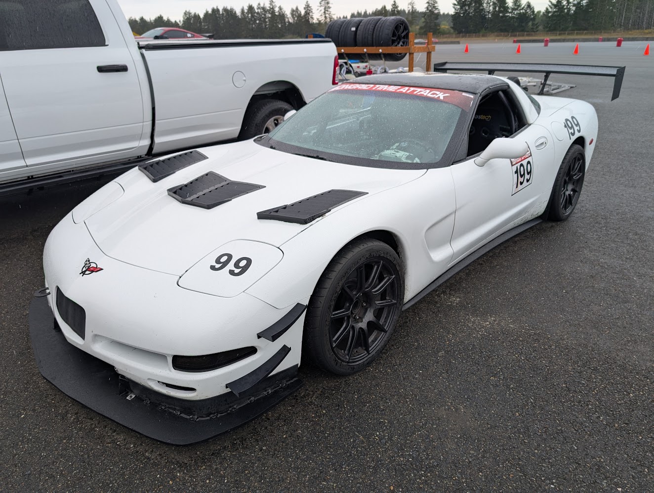 Shred Jesse's #199 1999 C5 Corvette parked at the track sporting full aero