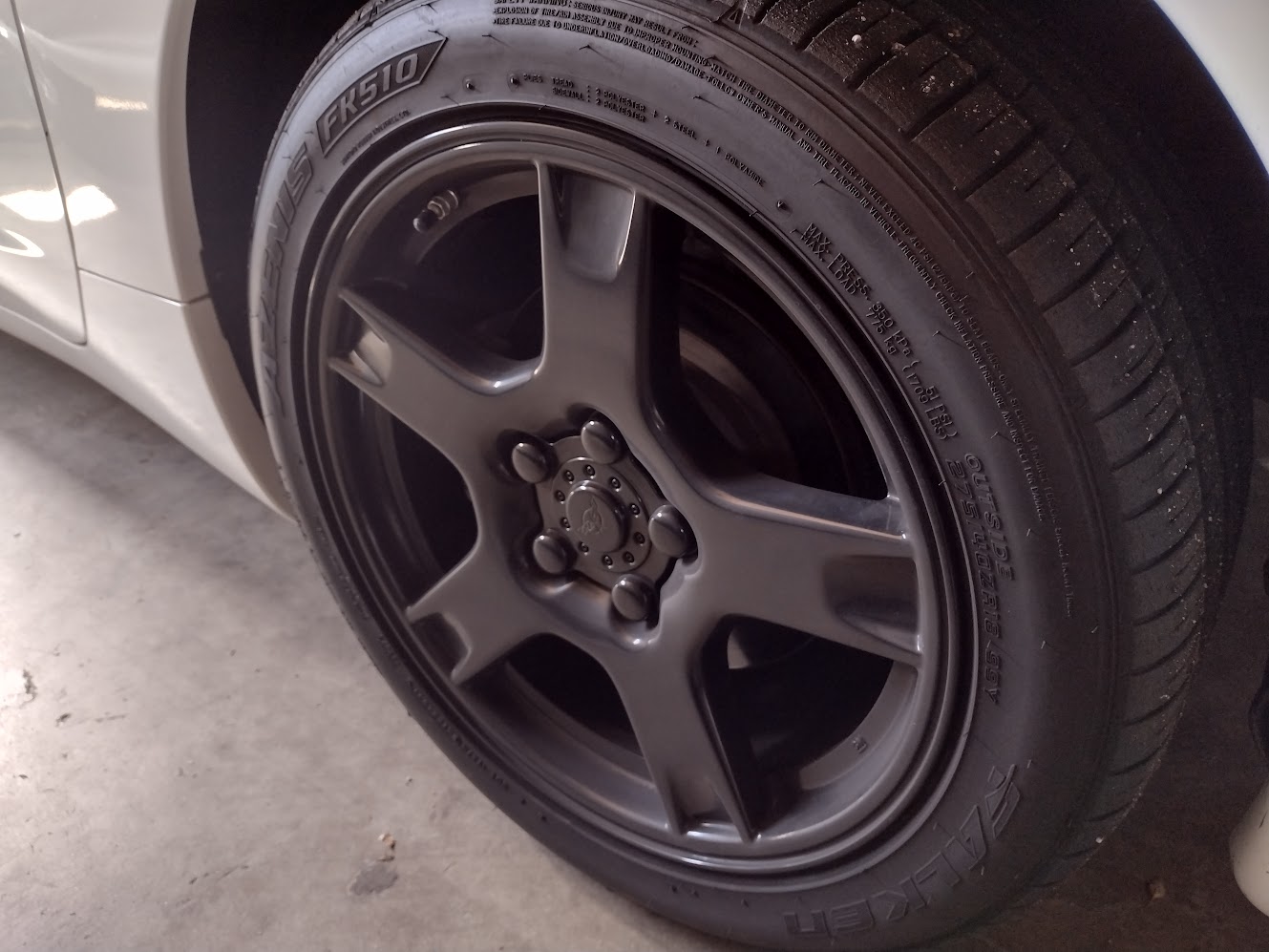 A rear C5 Corvette Wagon wheel powder coated black.