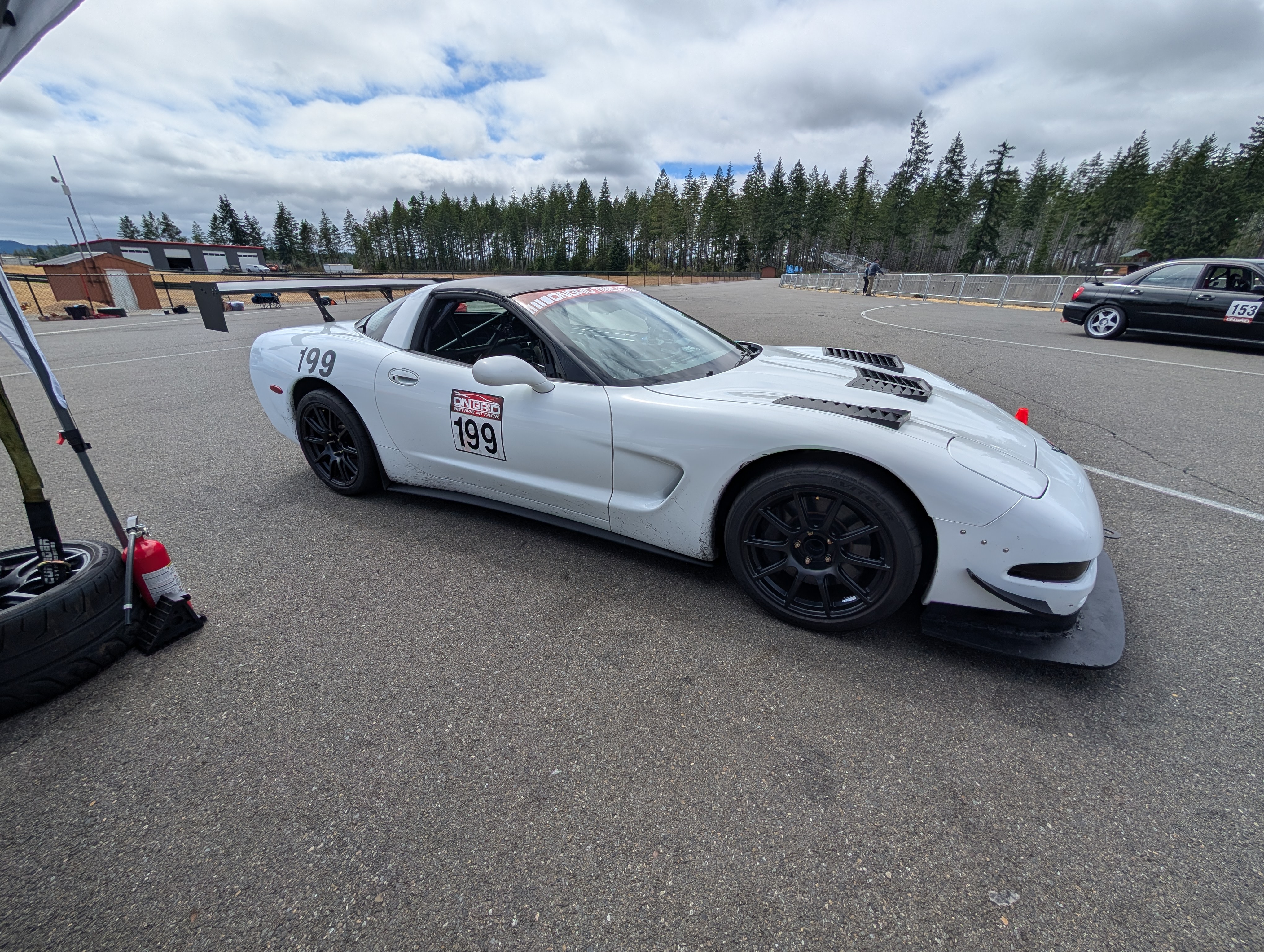 A white C5 Corvette #199 in the cold pits at the Ridge during an OnGrid time attack event