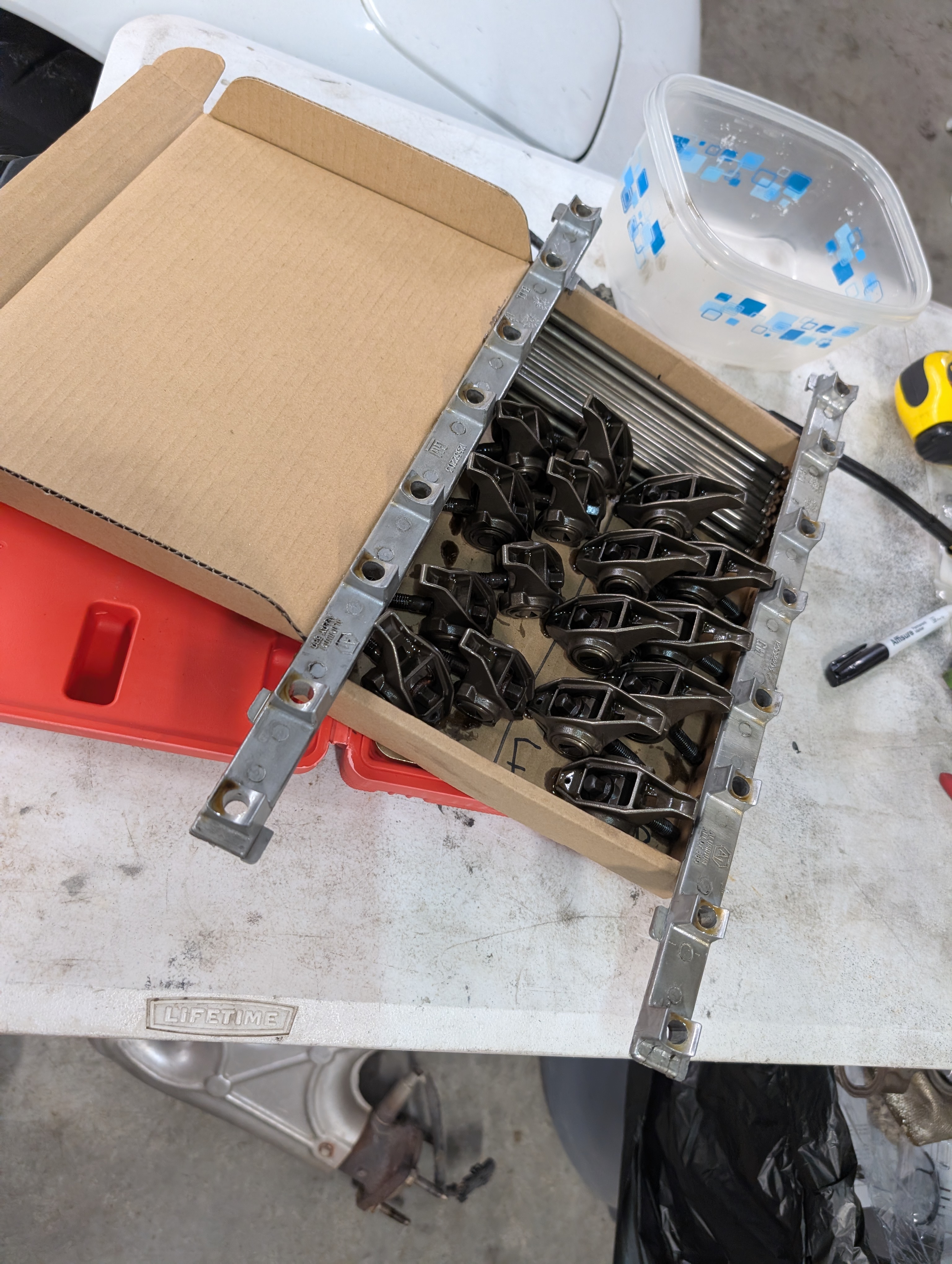 The roller rockers and pushrods from the dead to shred LS1 in a box showing they're all okay.