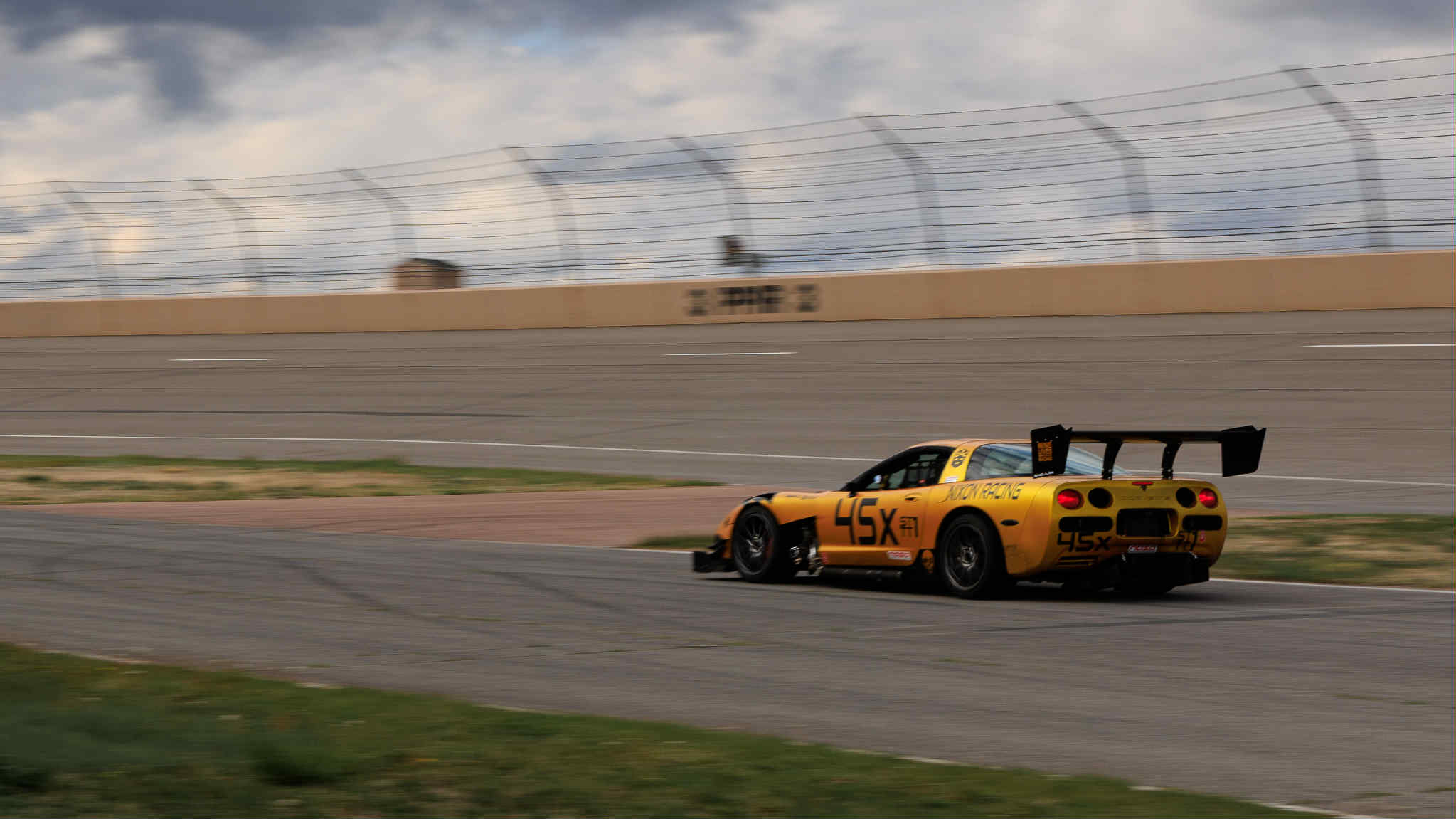 Colt Nixon's C5 Corvette waiting in the hot pits to enter the track