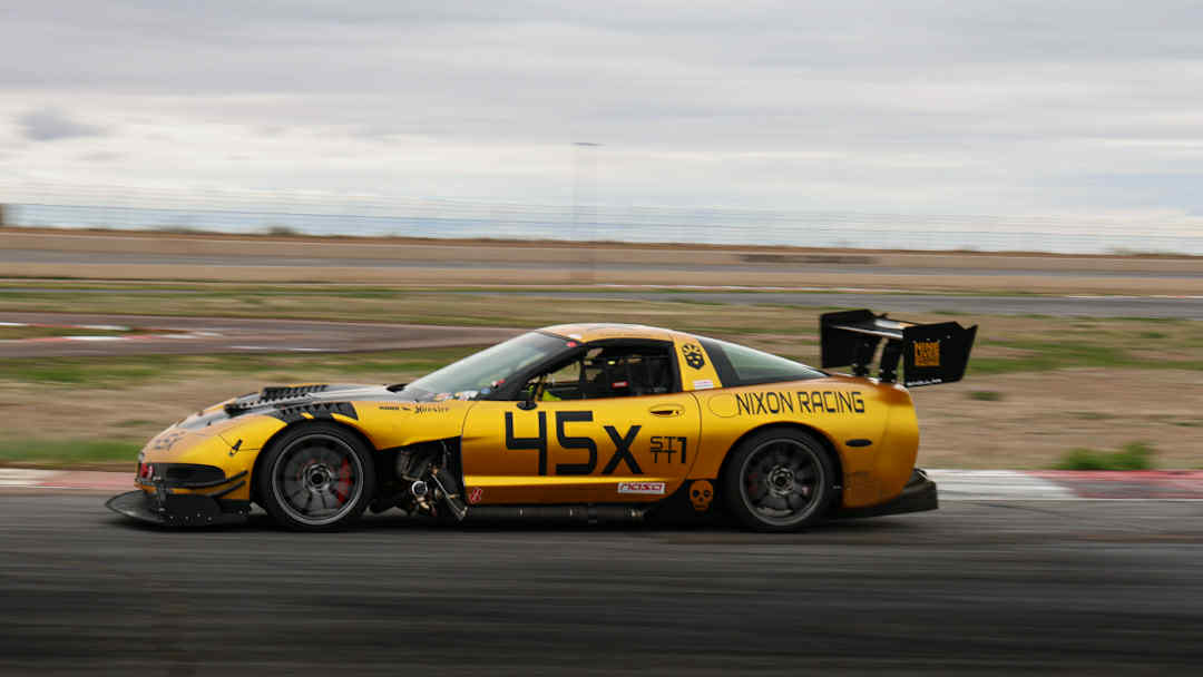 Colt Nixon's C5 Corvette, motion blur in the wheels and background clearly demonstrate that the car is moving very fast down the track