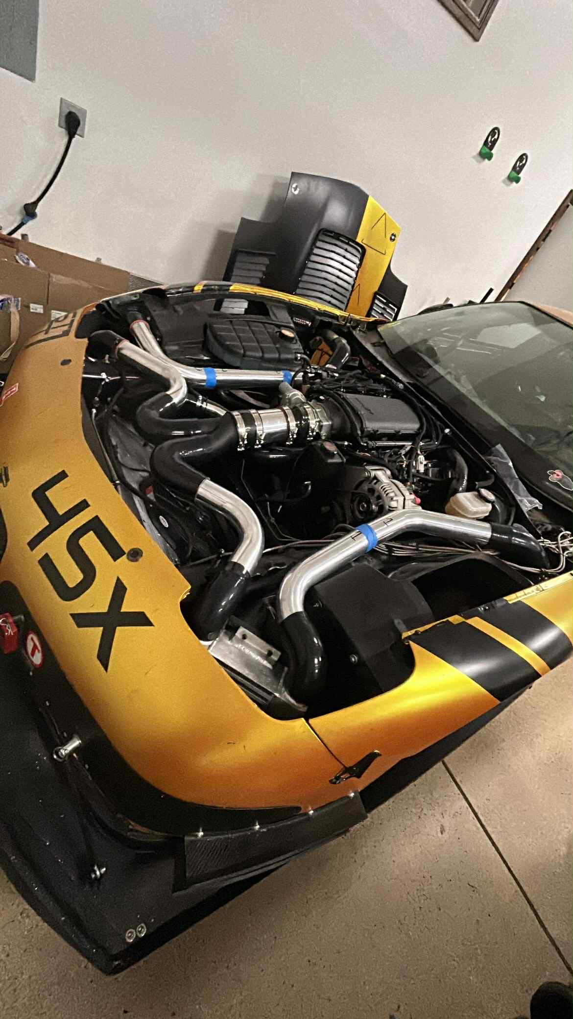 An overhead view of Colt Nixon's C5 Corvette engine bay, showing off the turbochargers