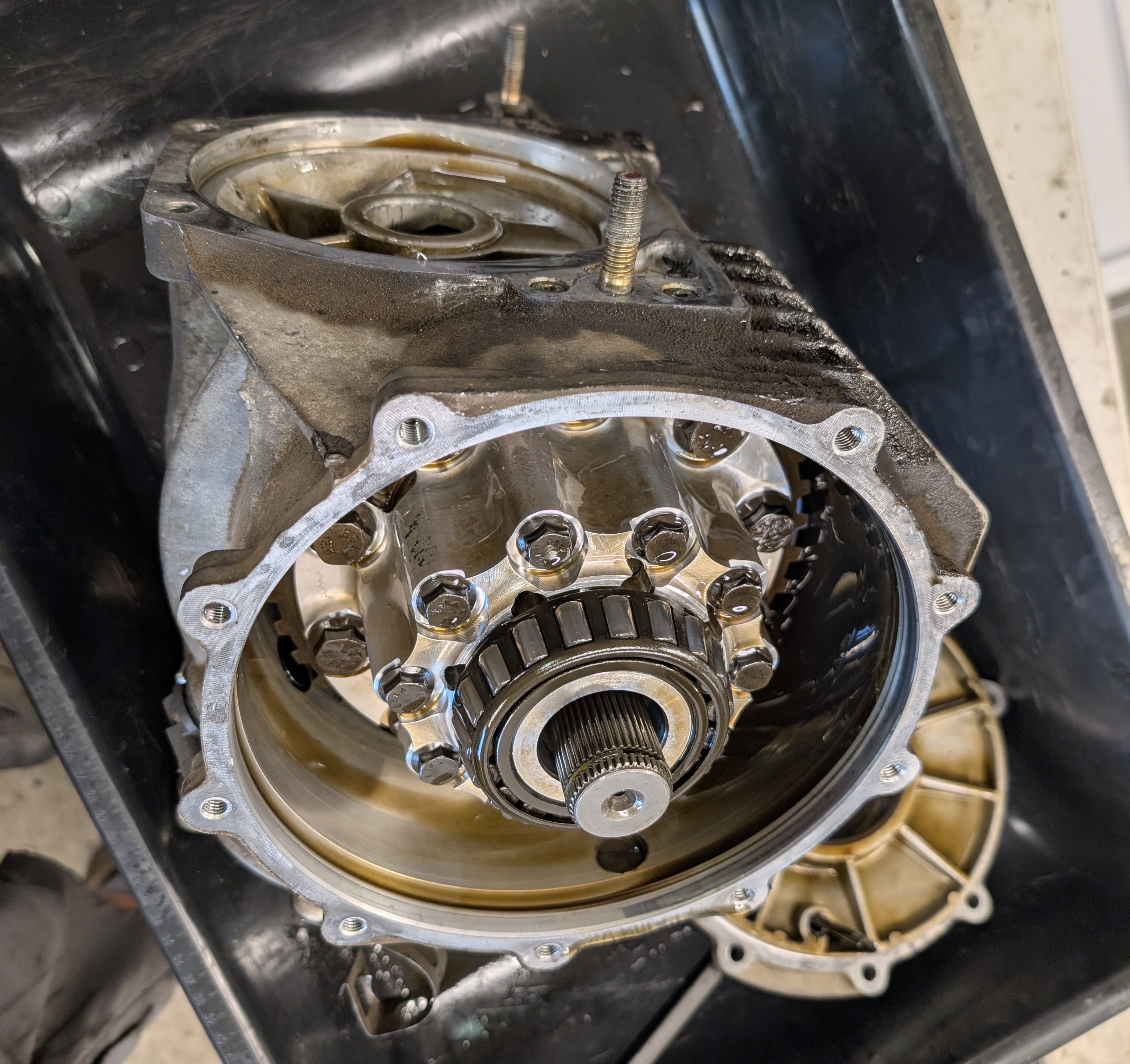 A C5 Corvette differential with the drives side cover removed showing the internal assembly