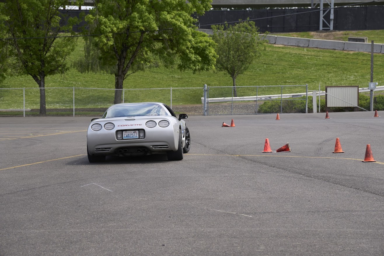 The D2S C5 Corvette making a hard right hander on an AX course. You can see the suspension loaded on the left side as they enter the turn.