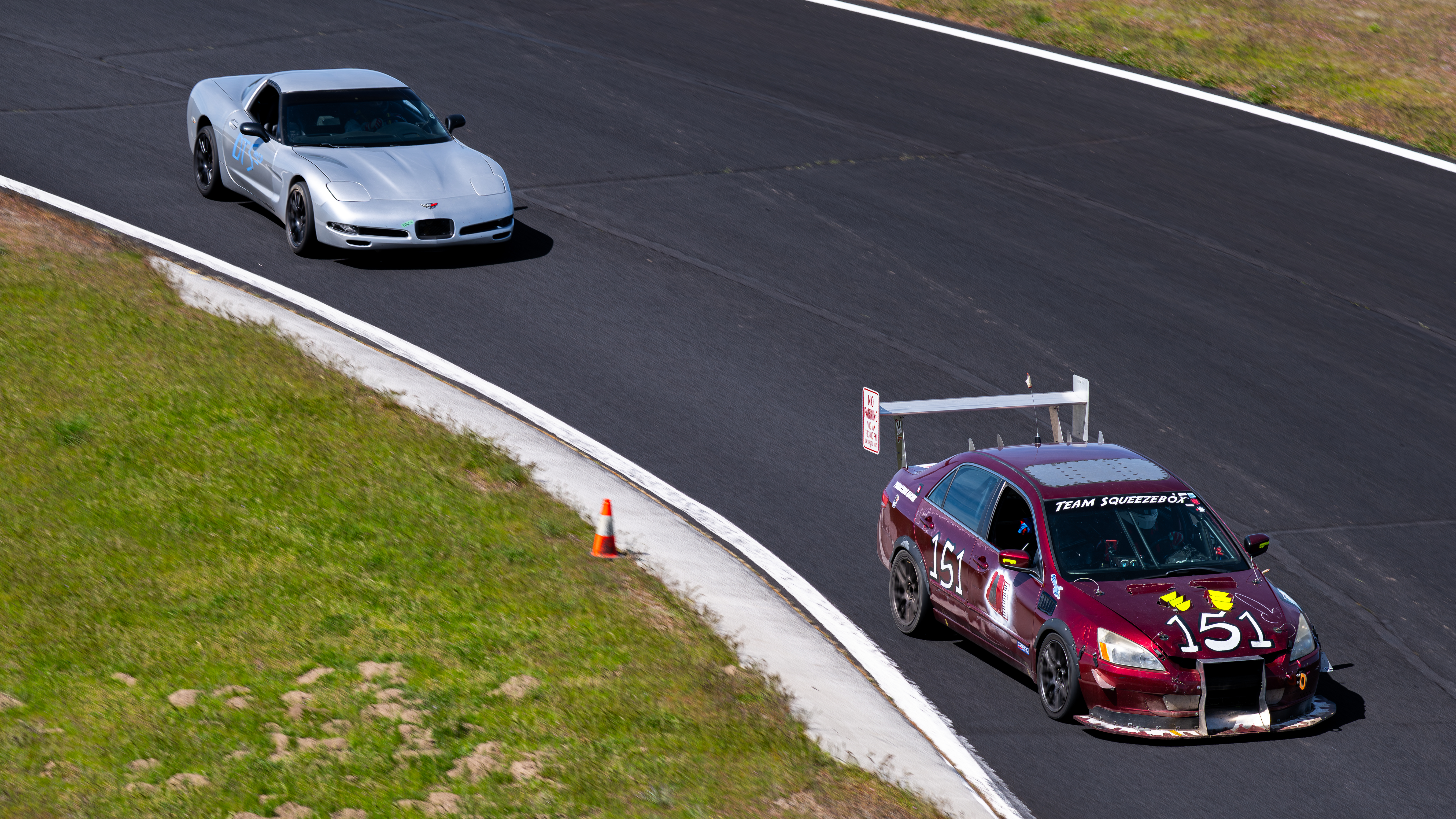 The Dead to Shred Corvette chasing a 24 hours of lemons accord around Oregon Raceway Park