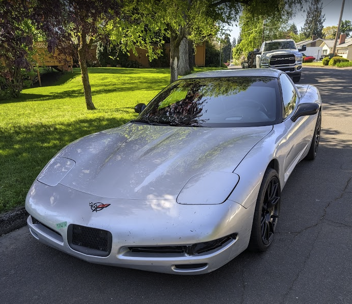 The Dead to Shred C5 Corvette parked on the street.