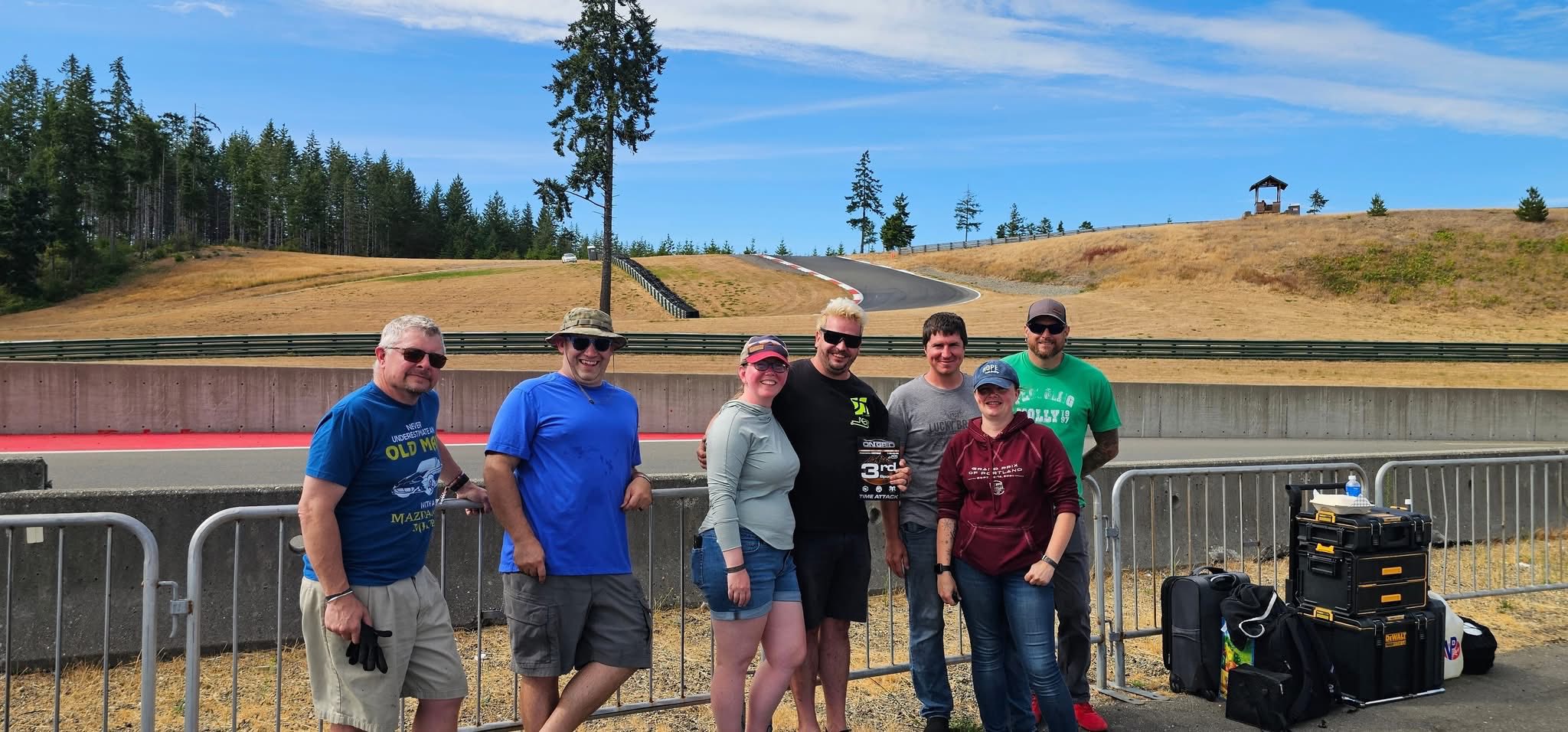 A group of friends at the Ridge posing after an OnGrid time attack event