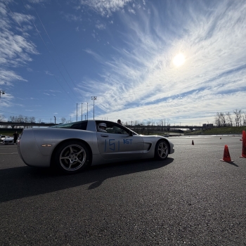 A picture of the dead to shred series C5 Corvette at the starting line. It has #151 on the side and BST written there as well.