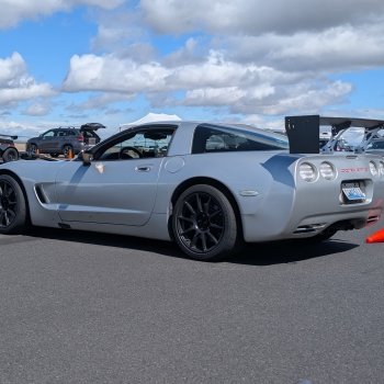 The 2001 Dead to shred grey C5 Corvette with a wing on it