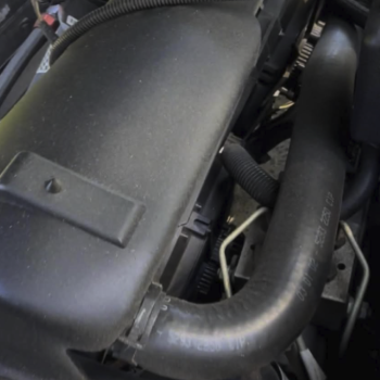 A picture of a C5 corvette engine bay with the brushless fans installed