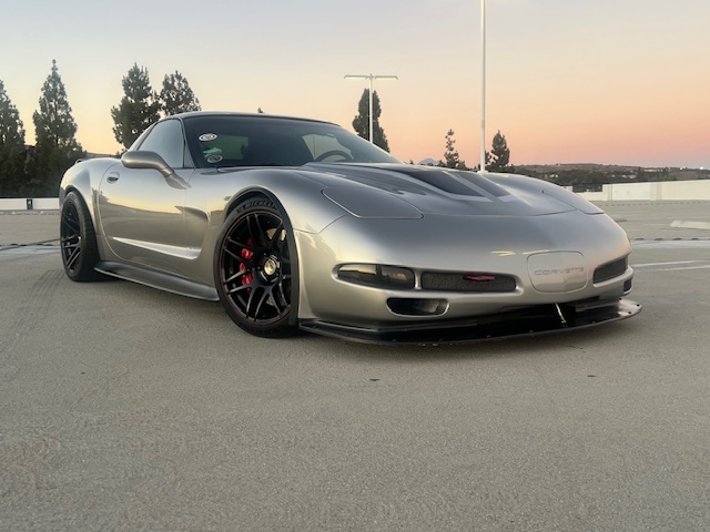 A hero shot of Brian Stephen's 300k+ mile grey and black c5 corvette